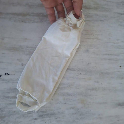 White fabric face mask used with filter pocket