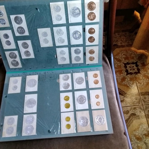 Collectible coins used, album with 19 cards, about 500 pieces