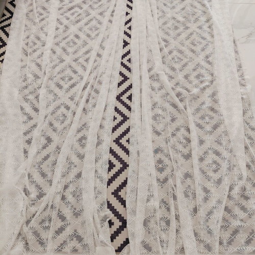 Two sewn white lace curtains, 2.5m height, 1.5m width each