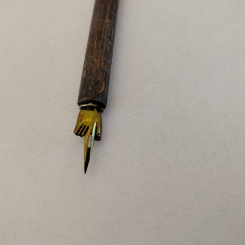 Wooden dip pen used, length 19cm