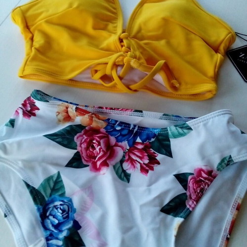 Women's swimsuit new, size small, yellow and floral
