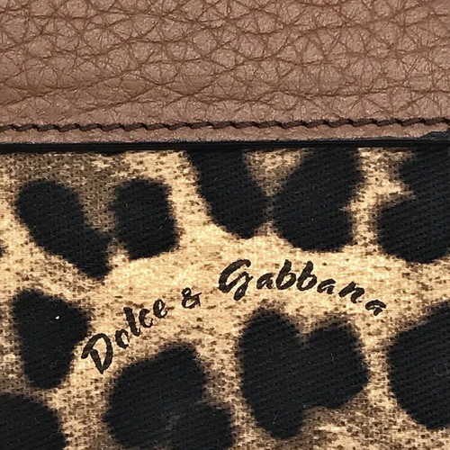 Dolce & Gabbana wallet used with leopard pattern and brown leather