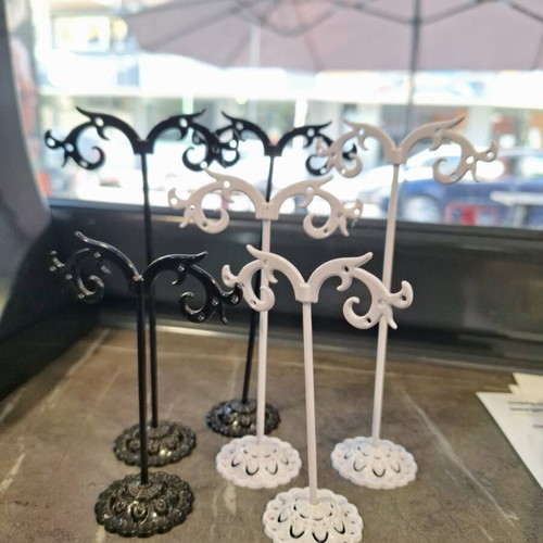 Earring stands, black and white