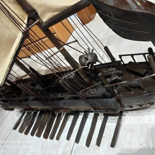 Handmade wooden sailboat used