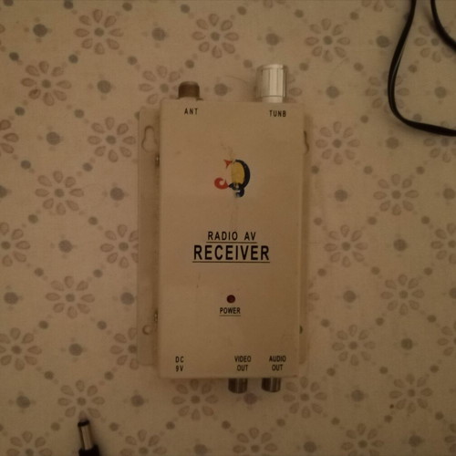 Wireless audio and video receiver with power supply