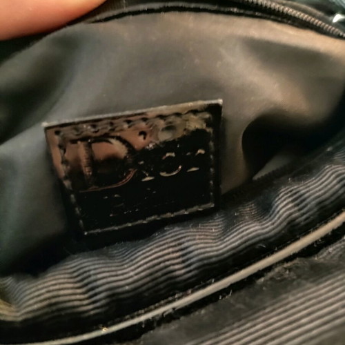 Dior small black hand bag like new with silver details