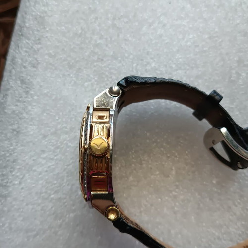 Vogue watch used with white dial and black leather strap