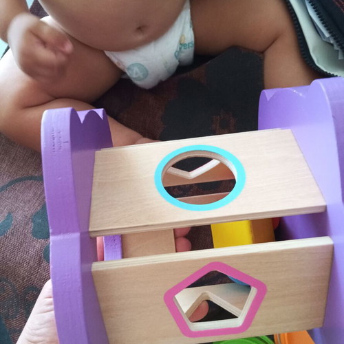 Toy set used with stacking cups and wooden owl shape sorter