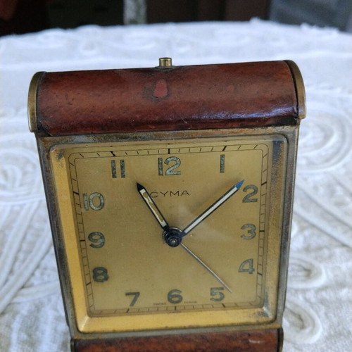 Cyma table clock used, Swiss made, brass with leather
