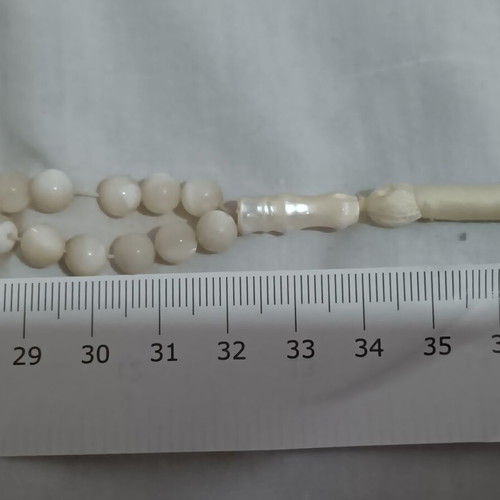 Komboloi from mother of pearl with 98 beads and white tassel