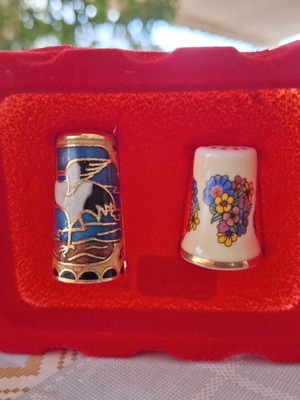 Thimbles set of 2 used, cloisonné and porcelain in velvet case