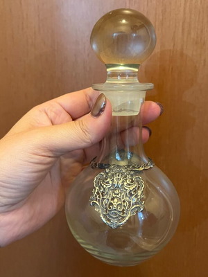 Antique carafe with metal design like new