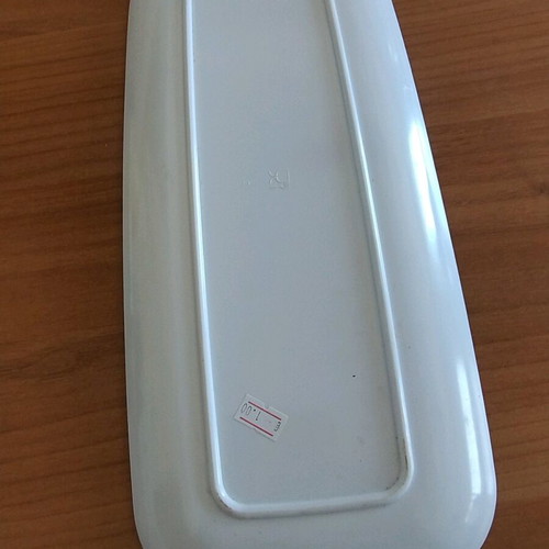 Serving platter elongated with kiwi background used, light signs of wear