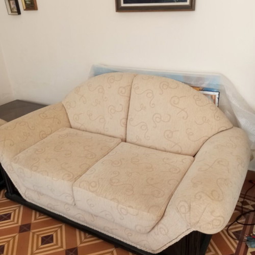 2 sofas with a free armchair