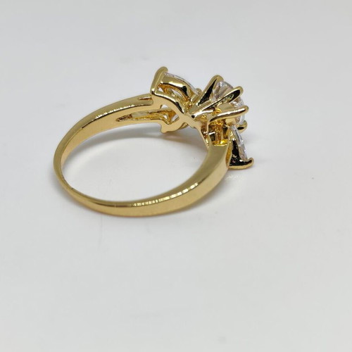 Elegant women's ring with central crystal and decorative petals, like new