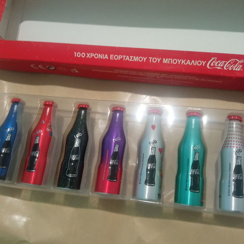 Coca-Cola Mini Bottles 100 Years Collectible Set like new