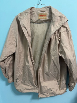 Lightweight waterproof jacket used, beige with hood, size M