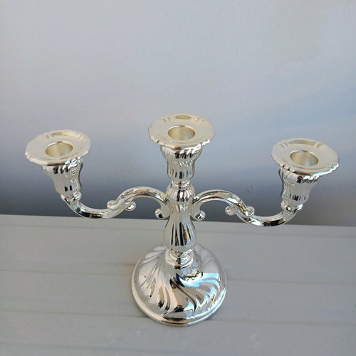 Silver-plated ornate three-arm candlestick new, excellent quality