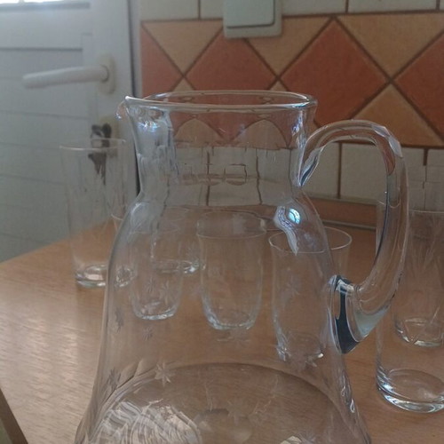 Crystal carafe with 7 glasses like new
