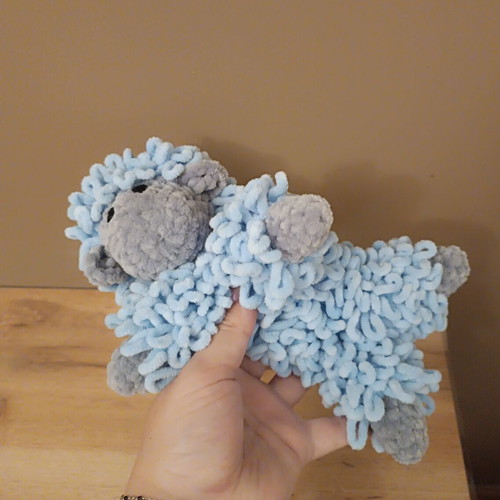 Handmade knitted cuddly sheep with soft velour yarn