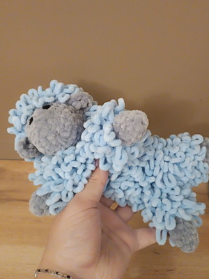 Handmade knitted cuddly sheep with soft velour yarn