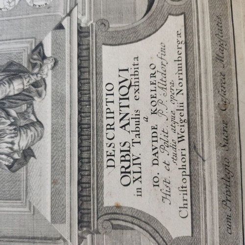 Engraving book frontispiece used with hero Atlas holding the earth