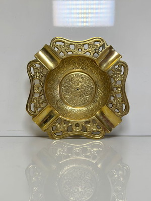 Vintage handmade brass ashtray with floral engravings