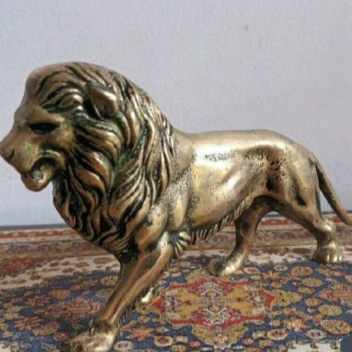 Solid bronze lion sculpture
