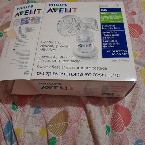 Philips Avent manual breast pump set like new with baby creams and soaps