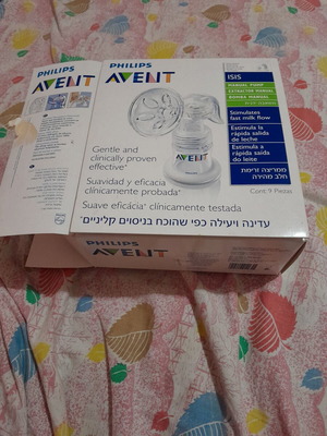 Philips Avent manual breast pump set like new with baby creams and soaps