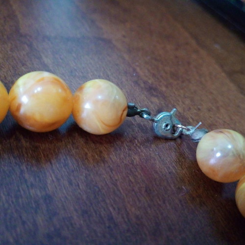 Vintage bakelite necklace used honey color with metal details