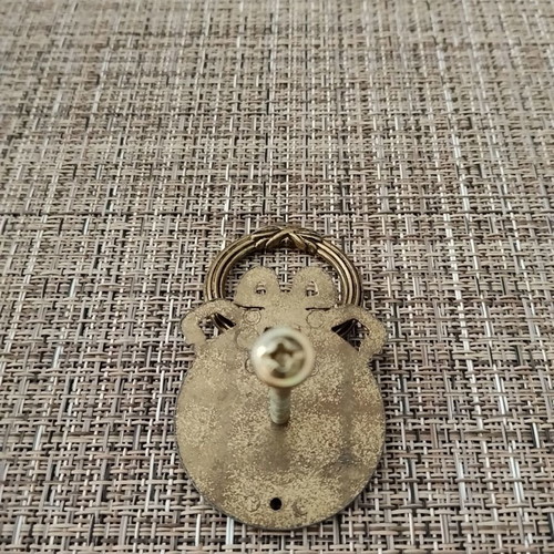 Classic furniture handle with decorative bow