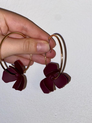 Hoop earrings used with purple flowers