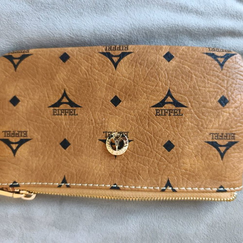 La tour Eiffel Desigual wristlet bag brown like new