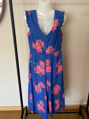Paranoia jumpsuit L like new with flowers and open back