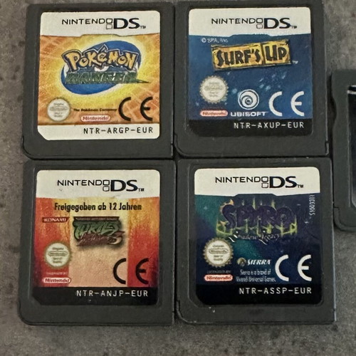 Nintendo DS game cartridges pack of 4: Spyro, Pokémon Ranger, Surf’s Up, Turtles
