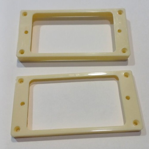 Set of two cream plastic rings for electric guitar humbucker pickups
