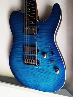 Modern Tele Style Guitar like new with Poplar body and Flame maple top