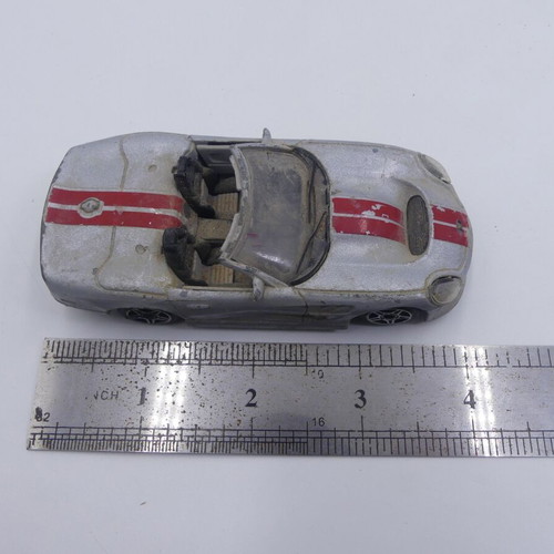 Ford Shelby Series 1 Burago Street Fire 1/43 used, silver with red stripes