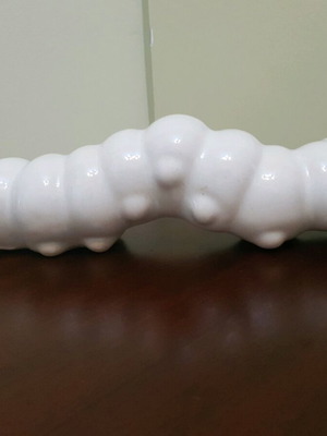 Ceramic caterpillar used