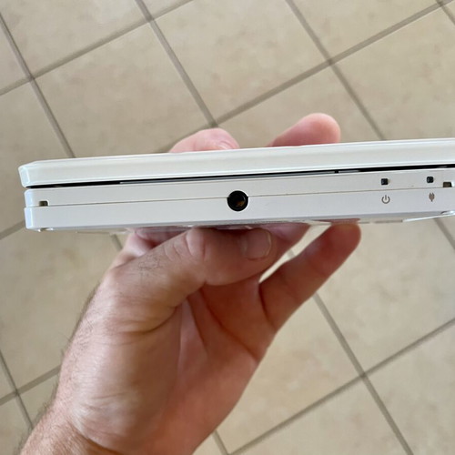 Nintendo 3DS white console with charger and case