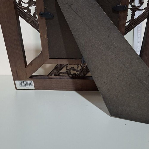 Wooden frame with metal details like new, classic decoration