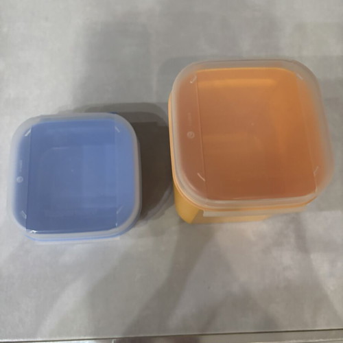 Tupperware canister in two colors