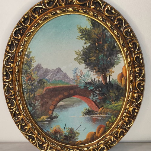 Oval vintage painting on canvas with golden frame used