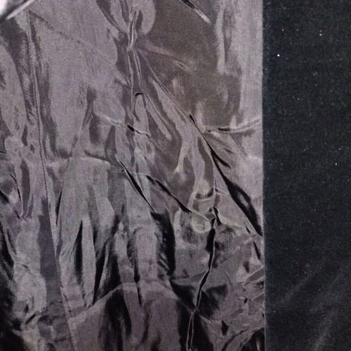 Velvet coat used with arm openings and gift bag