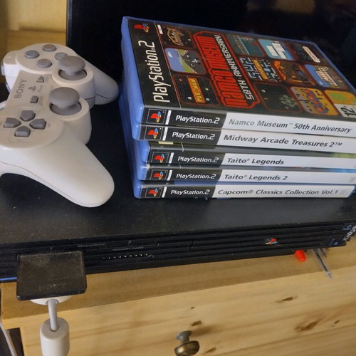 Sony PlayStation 2 used with games, joystick and memory card
