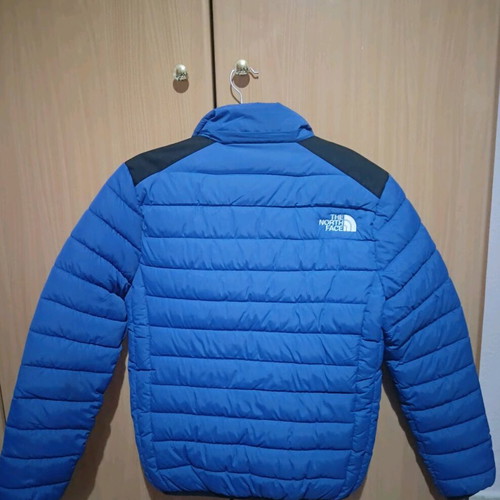The North Face blue jacket like new, size M unisex