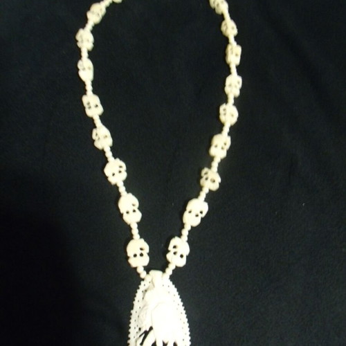 Old jewelry necklace used with white ornaments