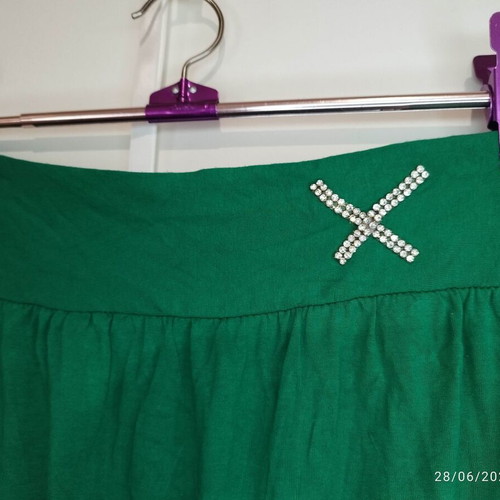 Emerald green strapless jumpsuit with rhinestone detail