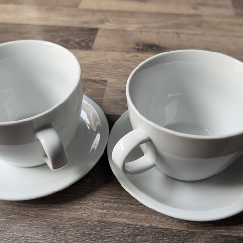 Set of 2 white coffee cups with saucers like new, minimal design